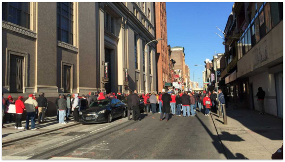 Photo by Eugene Sonn/WHYY In this picket line, Verizon workers in Philadelphia join nearly 40,000 strikers along the East Coast.